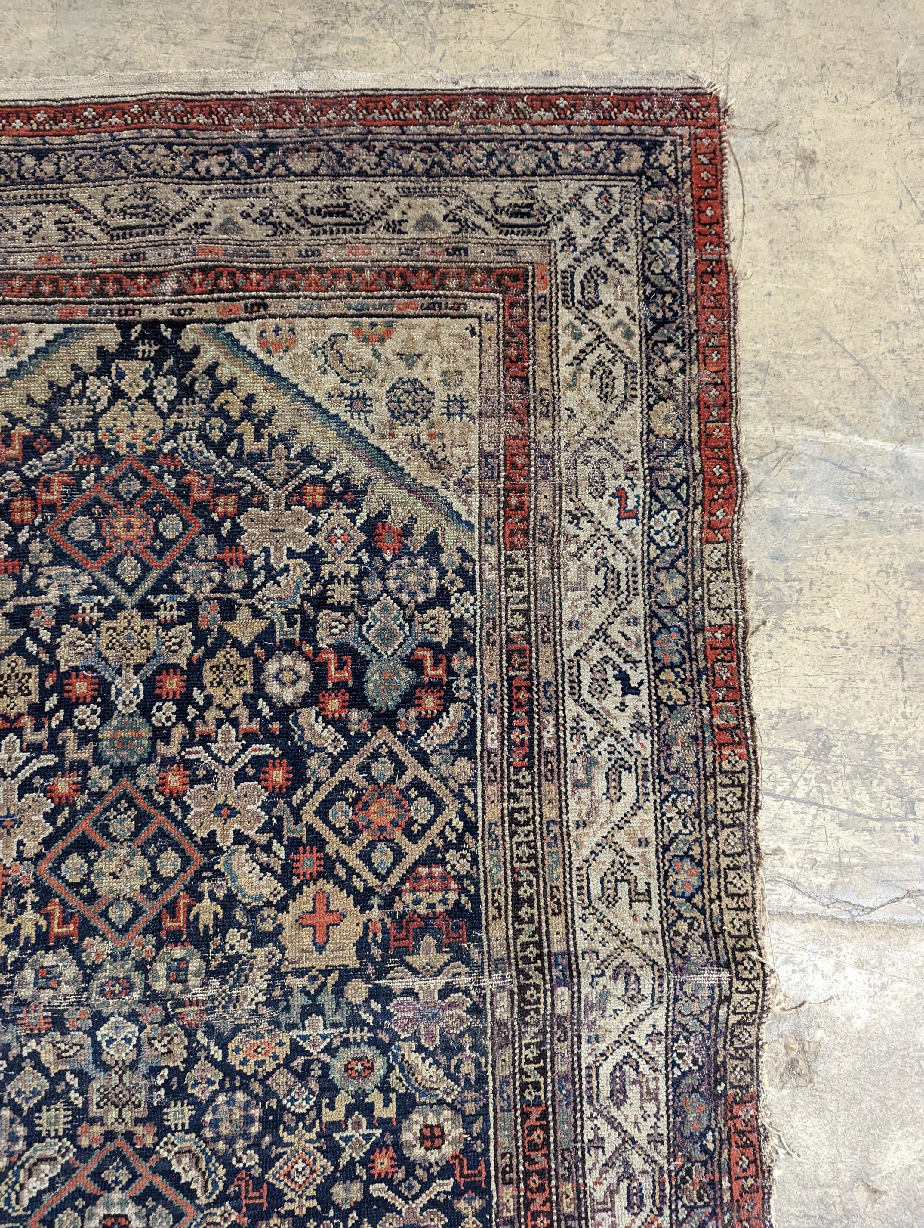 A North West Persian blue ground rug, 190 x 127cm